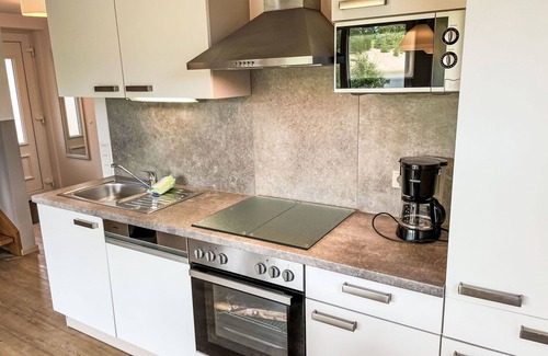 Hechthausen House | Nice apartment in villa for 6 guests with pool, WIFI, TV, terrace, pets allowed and parking