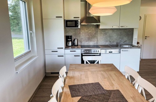 Hechthausen House | Nice apartment in villa for 8 people with WIFI, pool, TV, terrace, pets allowed and parking