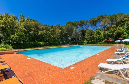 Rosignano Marittimo Apartment | Nice apartment for 4 people with WIFI, pool, TV and patio