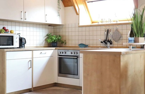 Dorumer Neufeld House | Nordic flair by the sea - pure relaxation in the "Poseidon" vacation home!