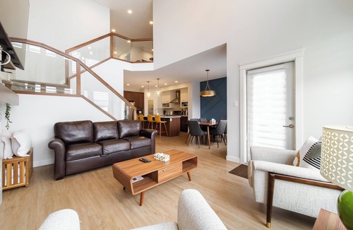 West Edmonton House | Nordic Retreat near WEM | Hot Tub, 2 Kitchens, 3 Lounges Sleeps 14