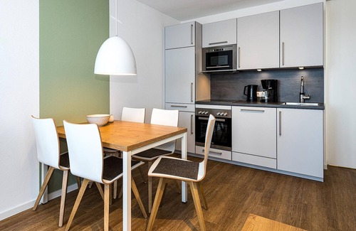 Bensersiel Apartment | Nordseenahes Ferienapartment mit Balkonen, Parkplatz, Schwimmbad- & Saunanutzung