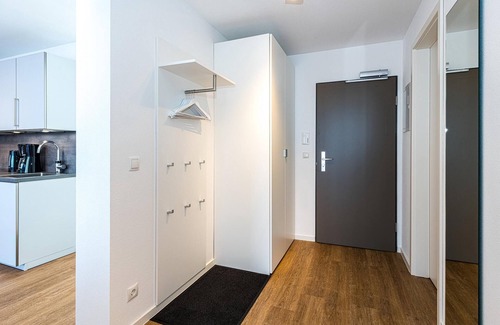 Bensersiel Apartment | Nordseenahes Ferienapartment mit Balkonen, Parkplatz, Schwimmbad- & Saunanutzung