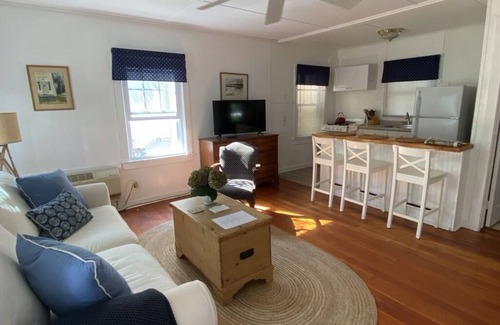Town of Southold Town House | North Fork water-view Cottage in coveted beach hamlet New Suffolk.