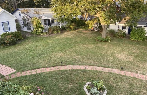 Town of Southold Town House | North Fork water-view Cottage in coveted beach hamlet New Suffolk.
