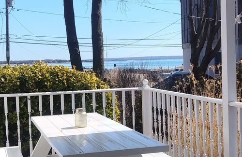 Town of Southold Town House | North Fork water-view Cottage in coveted beach hamlet New Suffolk.