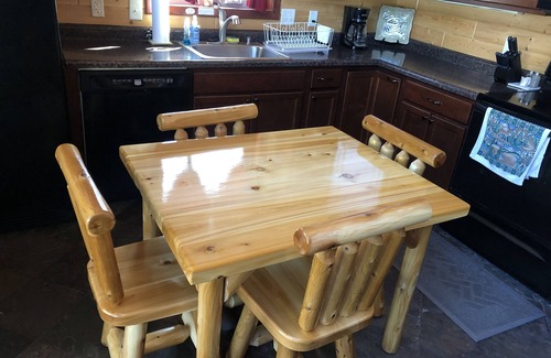 New Lisbon Cabin | Northwoods Getaway- Private swimming pond, hot tub, & 70 acres of woods