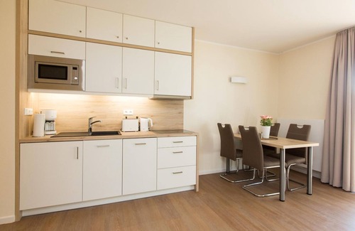 Plau am See Apartment | Nr 25 Modern 2-room apartment in a quiet location with fireplace. Dog allowed -