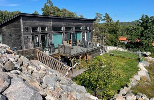 Lokholmen Apartment | Ny lägenhet på markplan med havsutsikt