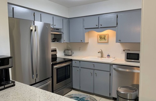 Demere Park Condo | O1 Two BR townhome in Ocean Walk with 1 king, 1 queen bed. Recently updated.
