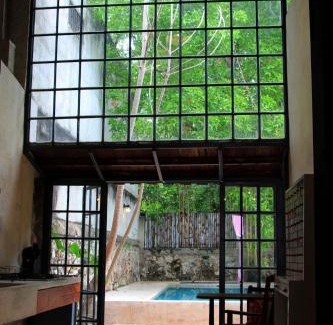 Barrio de Santiago Villa | Oasis with natural pool in the heart of Mérida