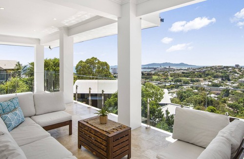 Castle Hill House | Ocean and City view group sized luxury.