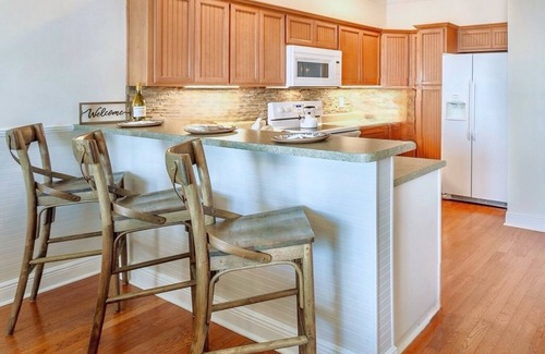 Panacea House | Ocean & Bayfront Home with Pool, Golf Cart, Tennis Court & Free Amenities