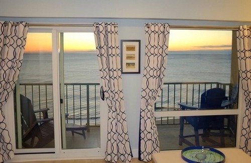 South Rehoboth Condo | OCEAN FRONT CONDO. ENJOY YOUR MORNING COFFEE SITING ON YOUR PRIVATE BALCONY WATCHING THE MORNING SUNRISE.