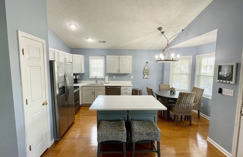 Surfside Beach House | Ocean Lakes -Site 1756 Outdoor seating area w/firepit. Serene canal views!
