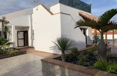 Corralejo Villa | Ocean Vibes is spacious private villa with a large pool and beautiful gardens.