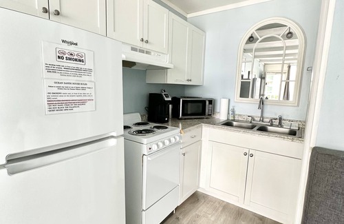 Atlantic Beach Condo | Ocean View Condo Private Beach Access Pool WiFi Kitchen BBQ