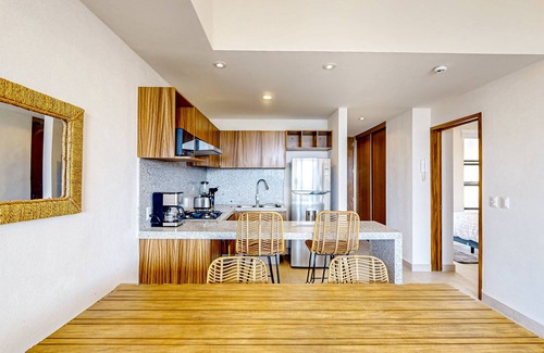 Bucerias Apartment | Ocean-view condo with infinity pool, rooftop lounge, & private balcony