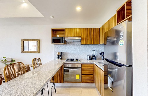 Bucerias Apartment | Ocean-view condo with infinity pool, rooftop lounge, & private balcony