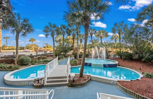 Windy Hill Condo | Oceanfront - Balcony - Kitchen - Pools - Hot tubs