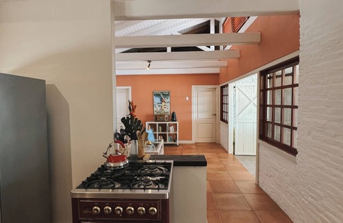 Boka Sami House | Oceanfront Caribbean styled bungalow situated on a clip above the Caribbean Sea.