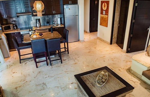 Downtown Condo | Oceanfront condo on the beach w/hot tub! Minutes walk to restaurants and bars!