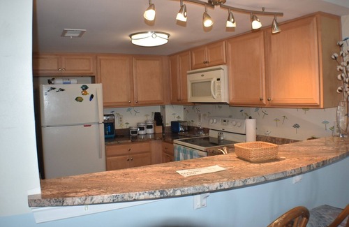 Garden City Condo | Oceanfront, immaculate condo w/180 degree views from your private deck