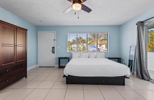 Fort Pierce House | Oceanfront Inn Room #1 - Partial Ocean View King Bed