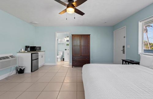 Fort Pierce House | Oceanfront Inn Room #1 - Partial Ocean View King Bed