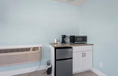 Fort Pierce House | Oceanfront Inn Room #1 - Partial Ocean View King Bed