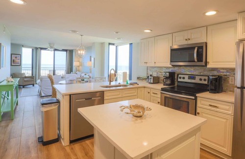 Isle of Palms Condo | Oceanfront, Renovated Corner Condo with Ocean Views, Community Pool. Yards from Beach