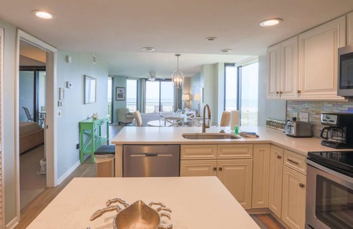 Isle of Palms Condo | Oceanfront, Renovated Corner Condo with Ocean Views, Community Pool. Yards from Beach