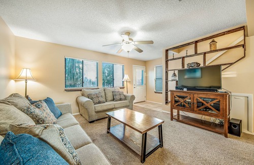 Sugar Beach House | Oceanfront townhouse near beach with pool, balcony, central AC, & washer/dryer