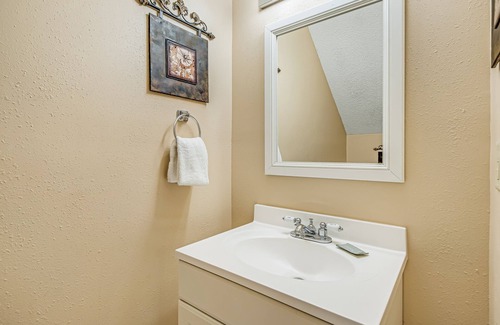 Sugar Beach House | Oceanfront townhouse near beach with pool, balcony, central AC, & washer/dryer