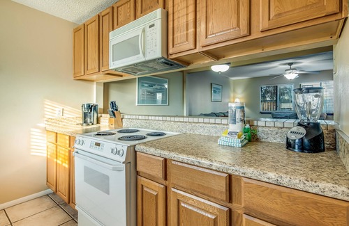 Sugar Beach House | Oceanfront townhouse near beach with pool, balcony, central AC, & washer/dryer