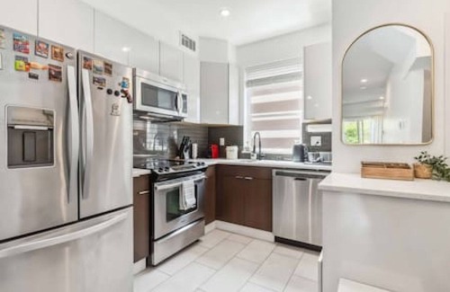 Grandview-Woodland House | Oceanside oasis + mountain view w/private rooftop