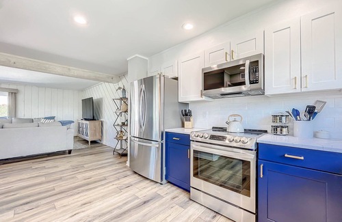 Sea Dunes Condo | Octopus Garden, A Luxurious Townhome Overlooking Pool! Ocean Views!
