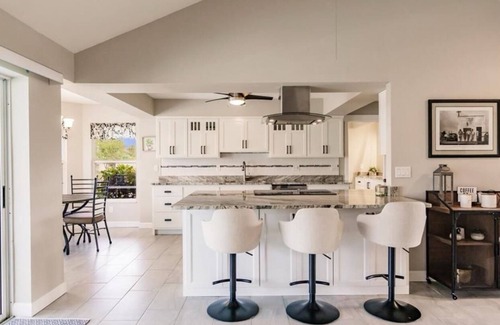 Fort Myers House | Offering breathtaking views of the sun setting over the water.