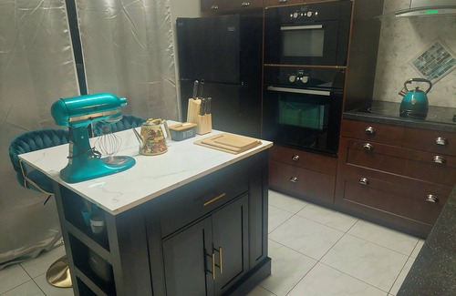Temple Terrace House | Ogun Suite - The Power of Perserverance and Innovation