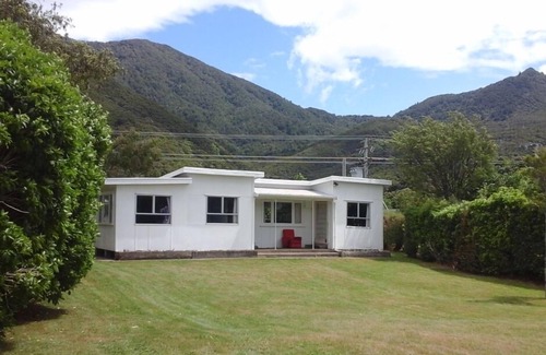 Okiwi Bay House | Okiwi Bay beach front bach