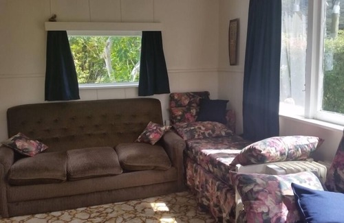 Okiwi Bay House | Okiwi Bay beach front bach