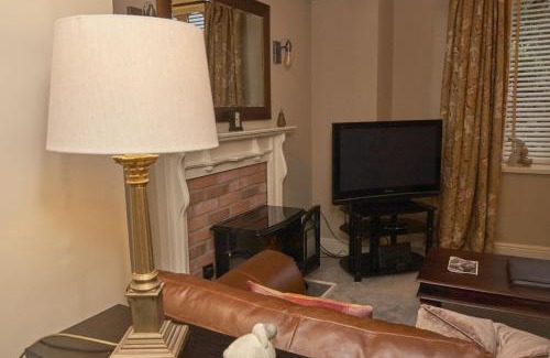 Grasmere House | Old Bakers Cottage ground floor apartment centrally located in Grasmere with patio area