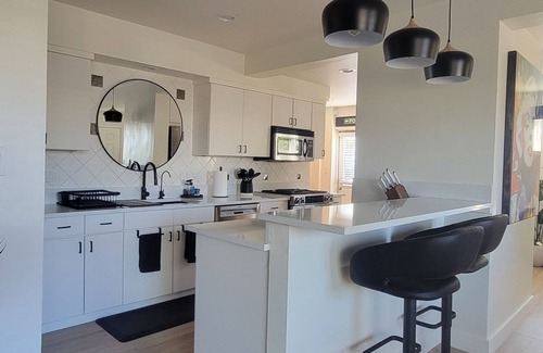 Southwest Village House | Old Town Scottsdale modern decor big pool hot tub TV on patio Comfort Convenient