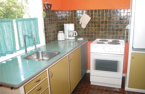 Vang House | Older vacation home, situated high above the sea and the beautiful fishing village of Vang on a beau