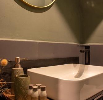 Craiova Apartment | Olive by Humpback