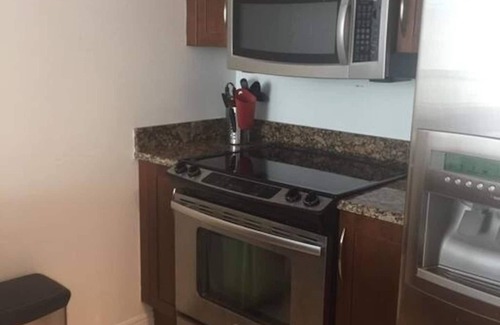 Boynton Beach Condo | One bedroom apt just 1 mile to the beach with pool, gym, and playroom!