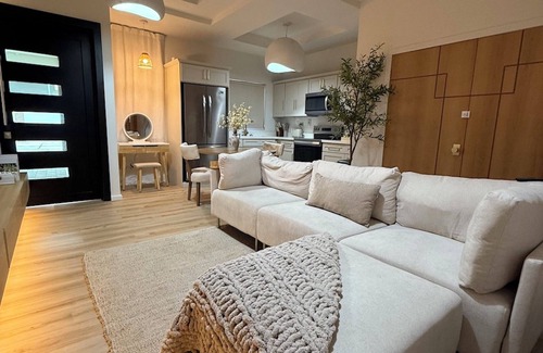 Barbican Apartment | One Bedroom Gated Apartment with rooftop terrace mountain views and pool