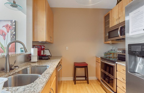 Downtown Condo | One Bedroom Hideaway w/free parking steps to Downtown