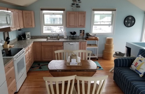 Cape Cod House | One bedroom home located Directly on Private Beach with A/C