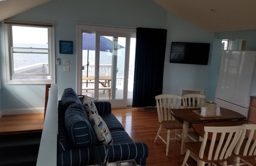Cape Cod House | One bedroom home located Directly on Private Beach with A/C